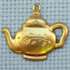daisy teapot brass charm