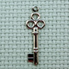 clover silver key charm