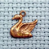 swan brass charm
